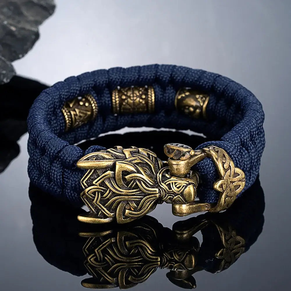 Bracelets de loup runes viking en tissu bleu avec un fermoir en métal au design celtique.