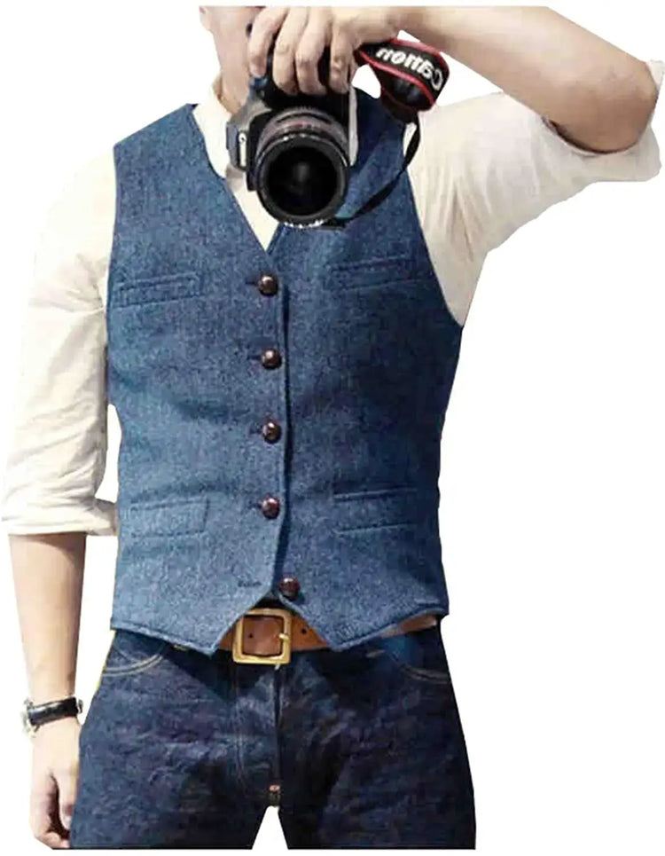 Denim gilet worn by a man taking a photo, showcasing timeless elegance and style in a casual outfit.