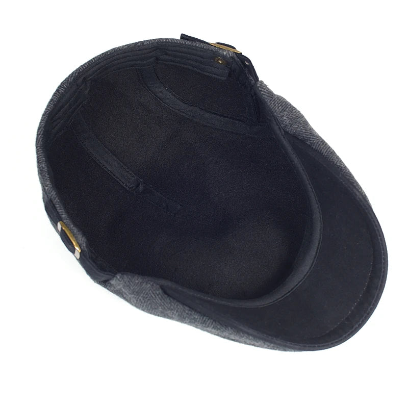 Vue intérieure de la casquette belle époque en laine, style Gatsby, conçue pour le confort en hiver.