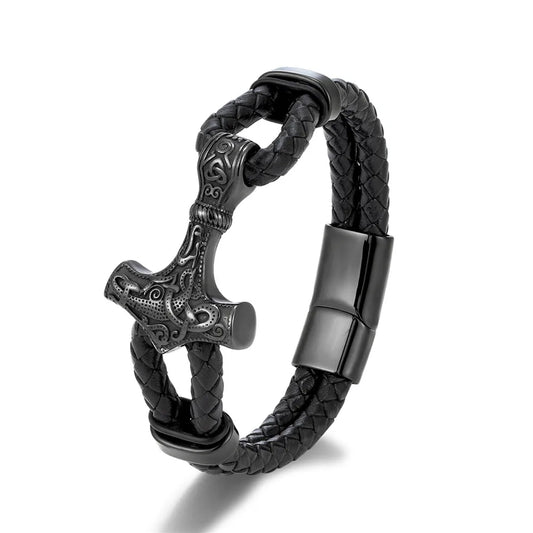 Black leather bracelet featuring an intricately designed Thor's hammer charm.