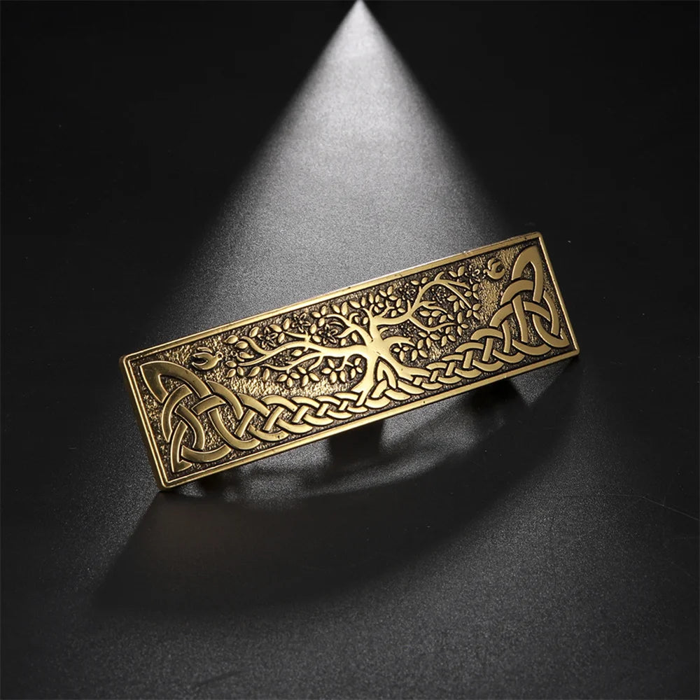 Celtic barrette featuring intricate tree and knot design, showcasing craftsmanship and unique style.